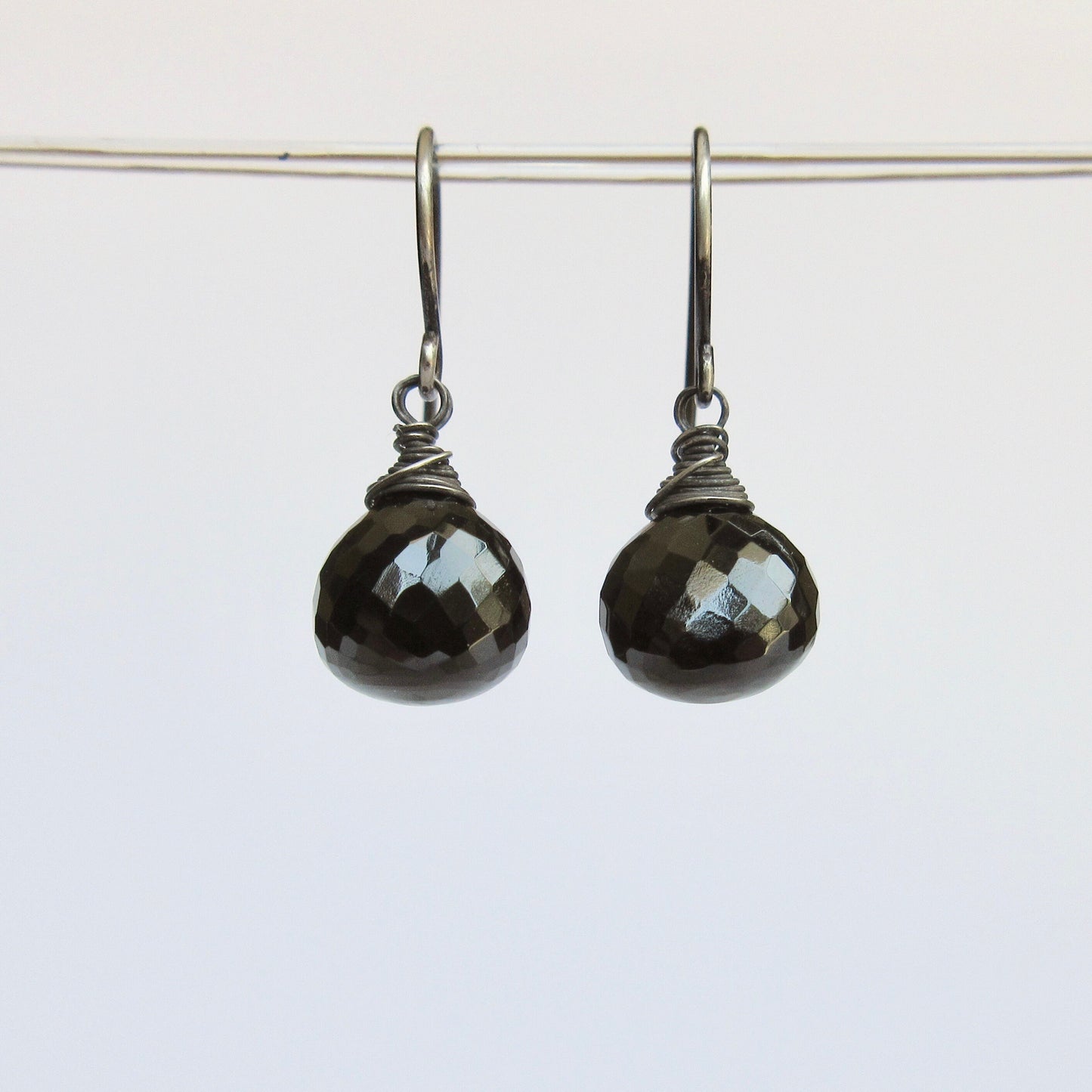 Black spinel earrings with blackened sterling wrapped wire