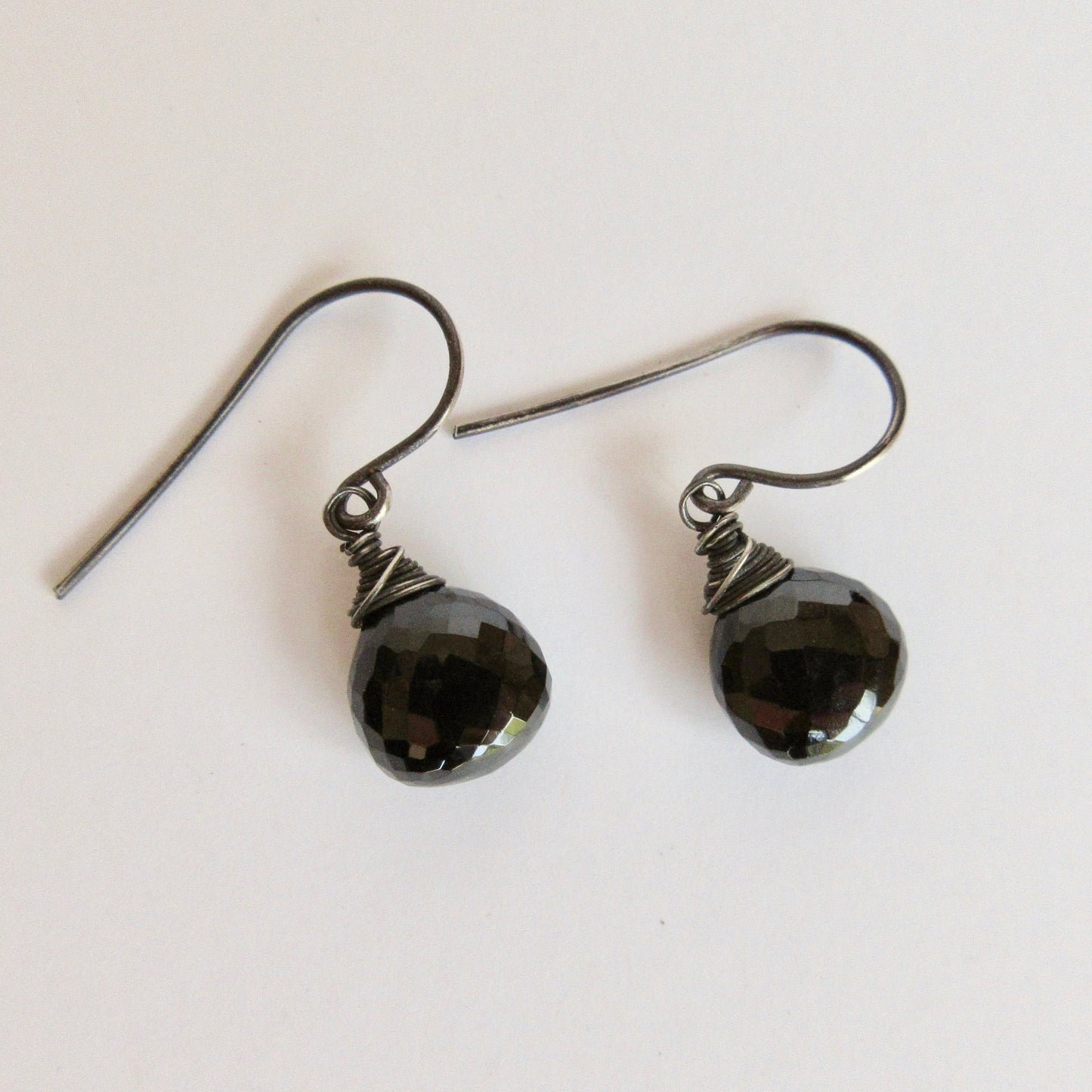 Black spinel earrings with blackened sterling wrapped wire
