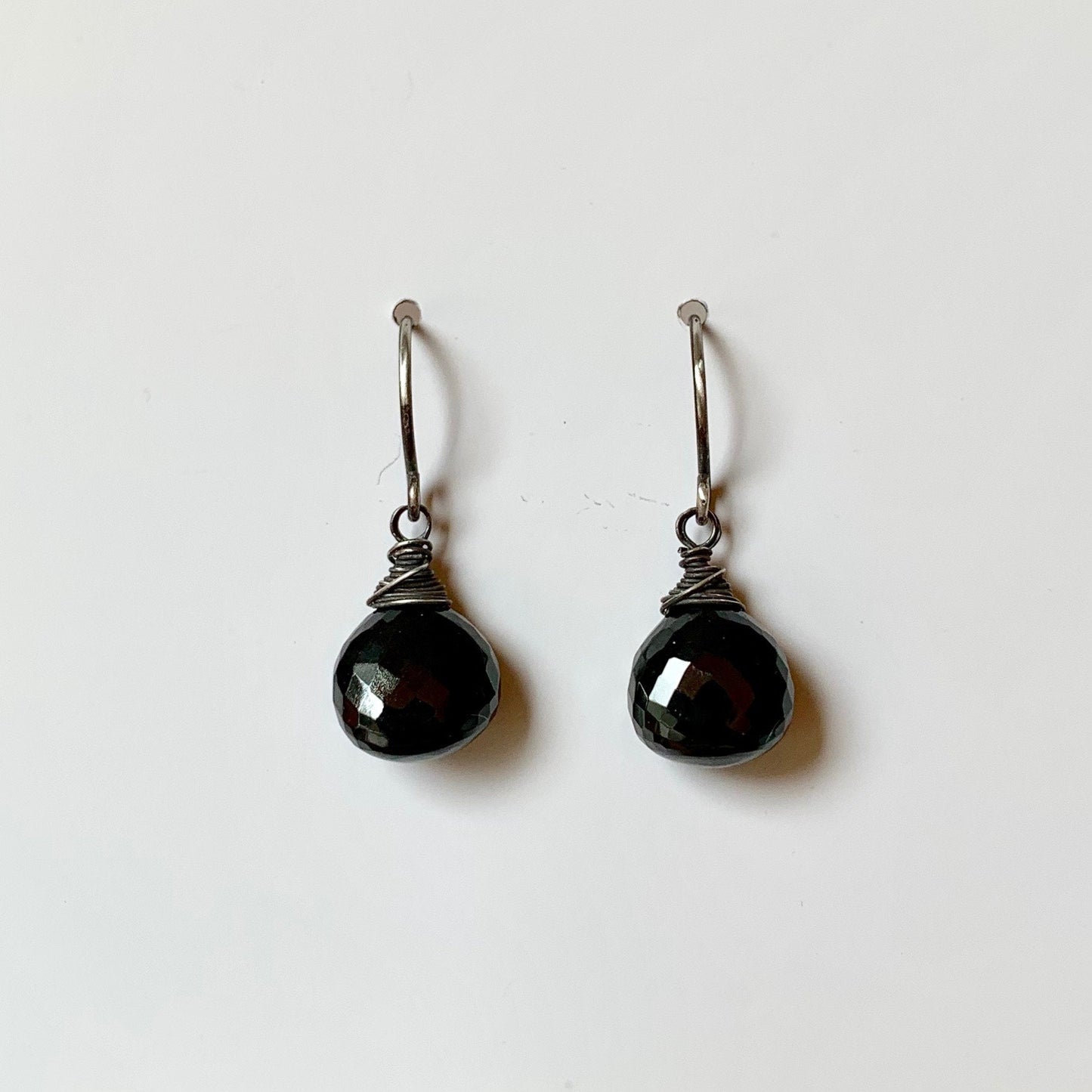 Black spinel earrings with blackened sterling wrapped wire