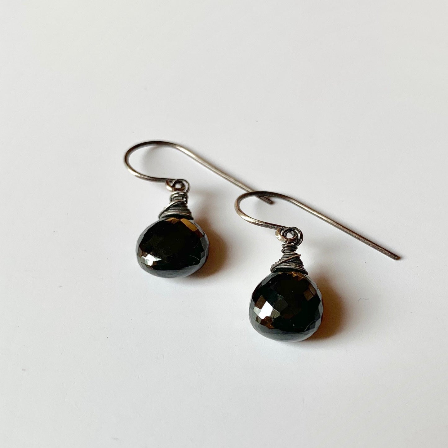 Black spinel earrings with blackened sterling wrapped wire