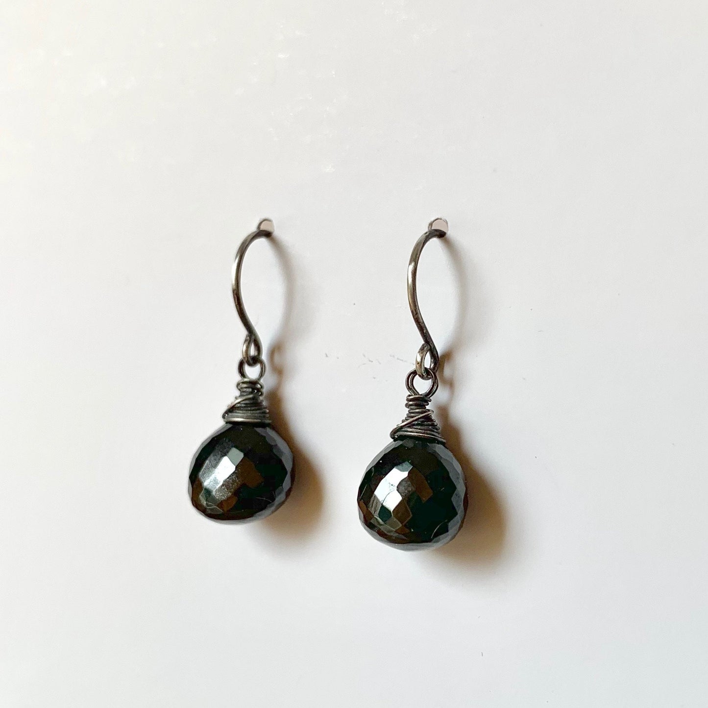 Black spinel earrings with blackened sterling wrapped wire